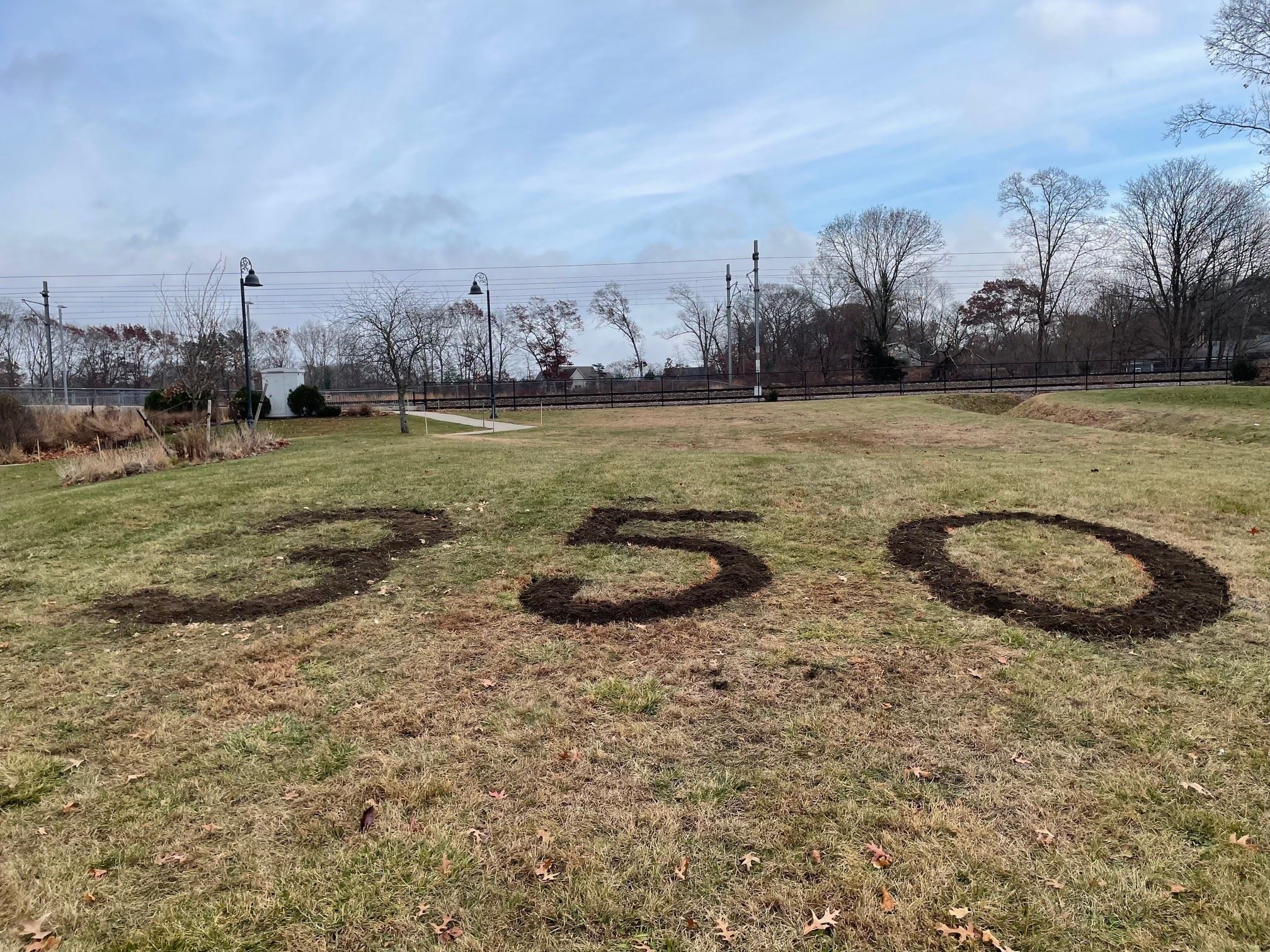 The number 350 dug into the ground.